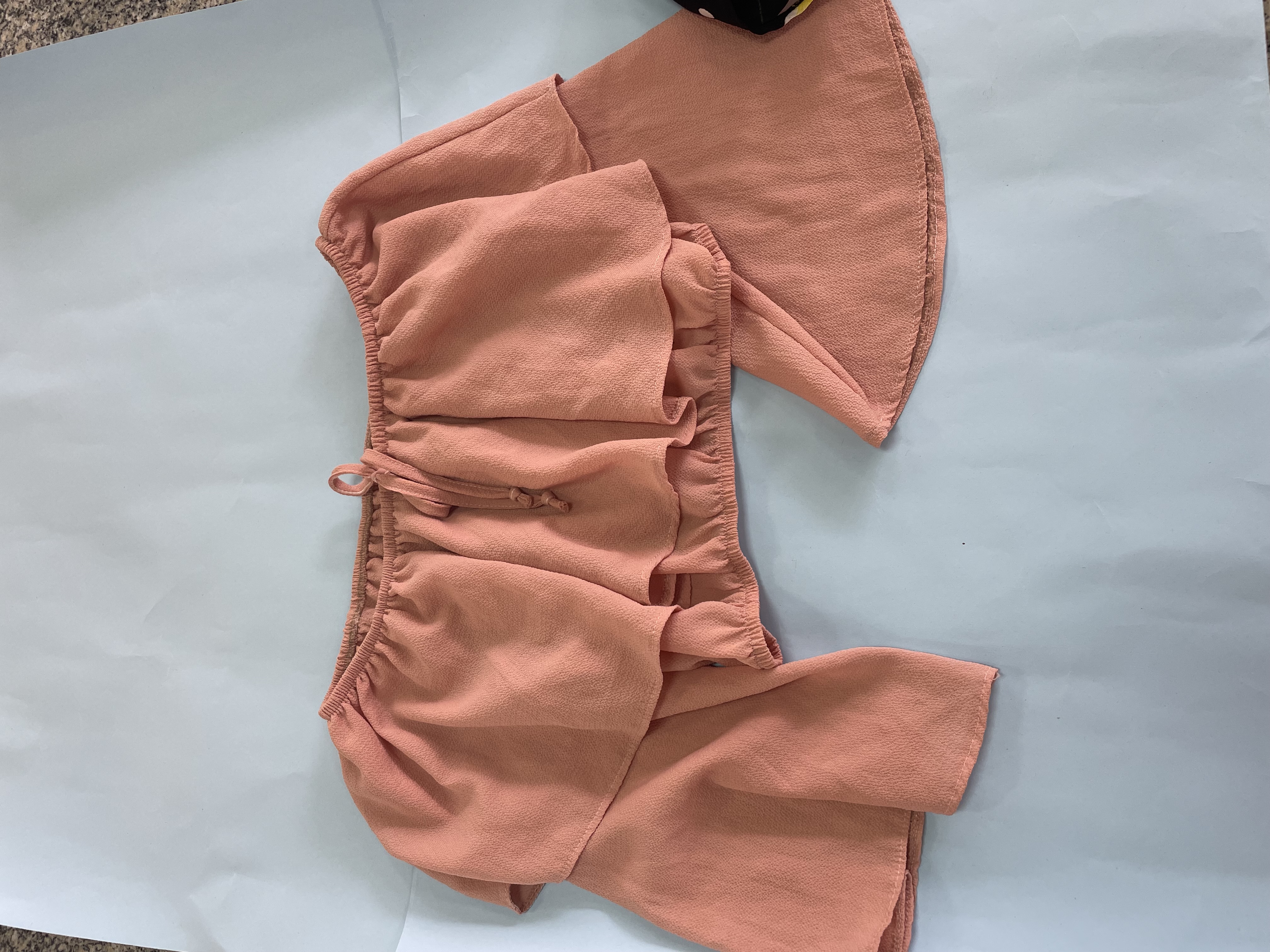 Blusa rosa clarinho com mangas